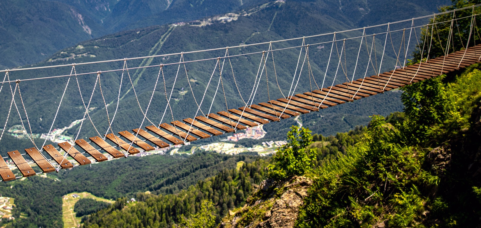 Empty rope bridge in the mountains